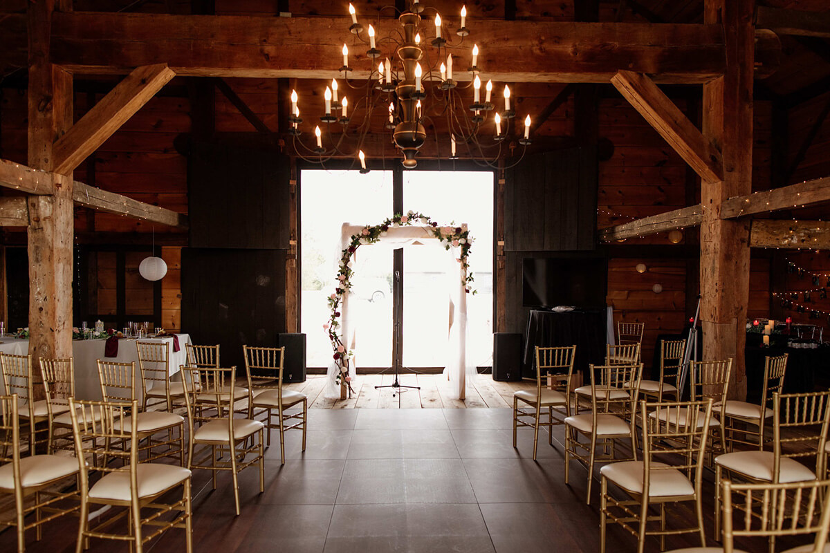 Rustic barn venue set up for wedding ceremony at Providence Barn.