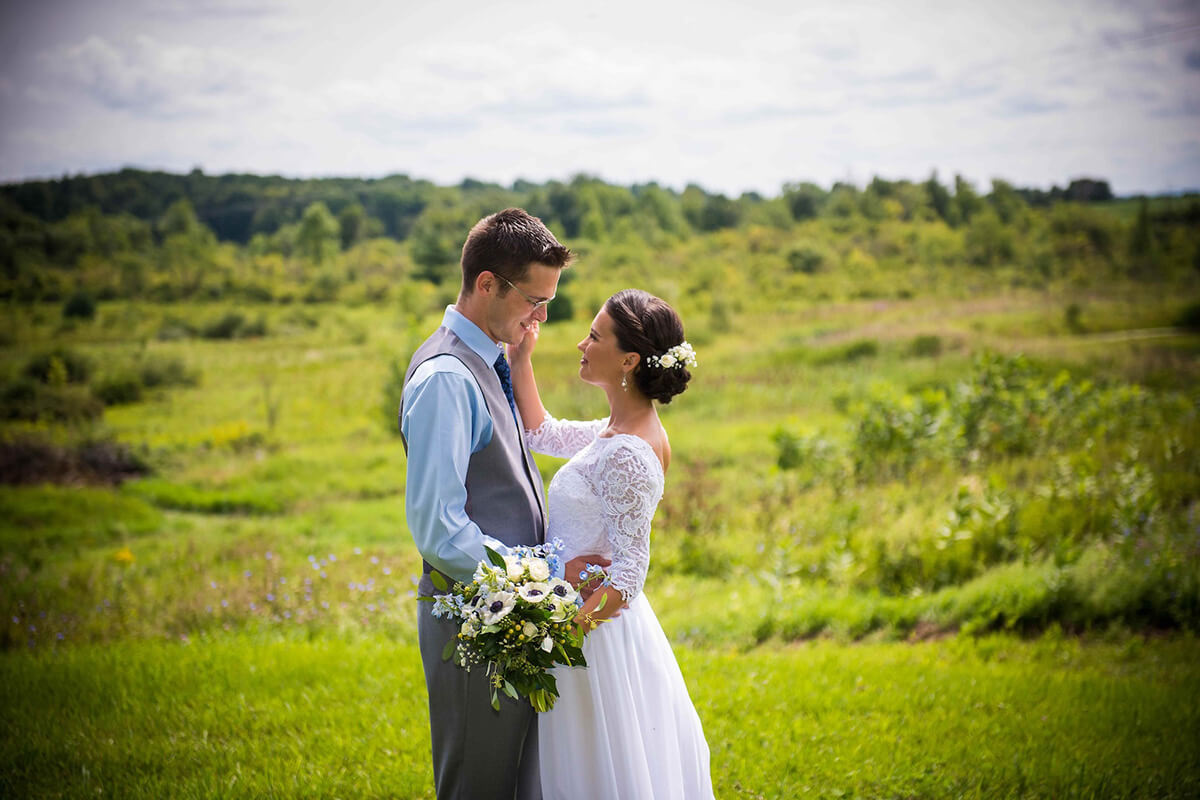 Outdoor wedding photography of newly married couple at Providence Barn.