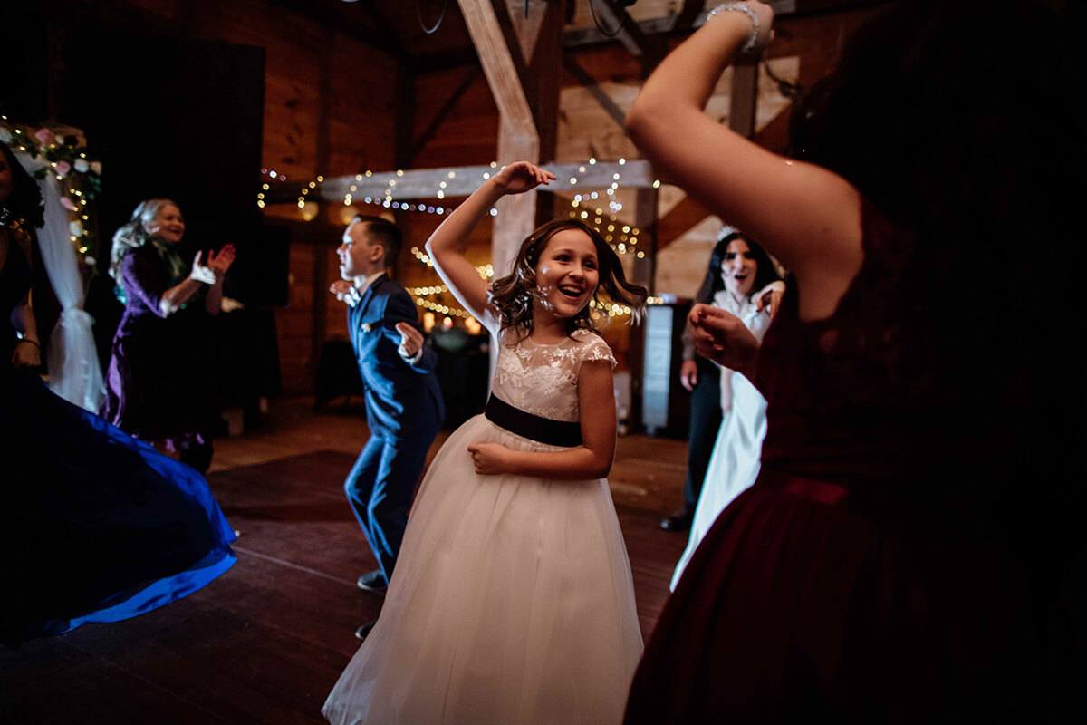 Lively dance floor inside scenic wedding venue at Providence Barn.